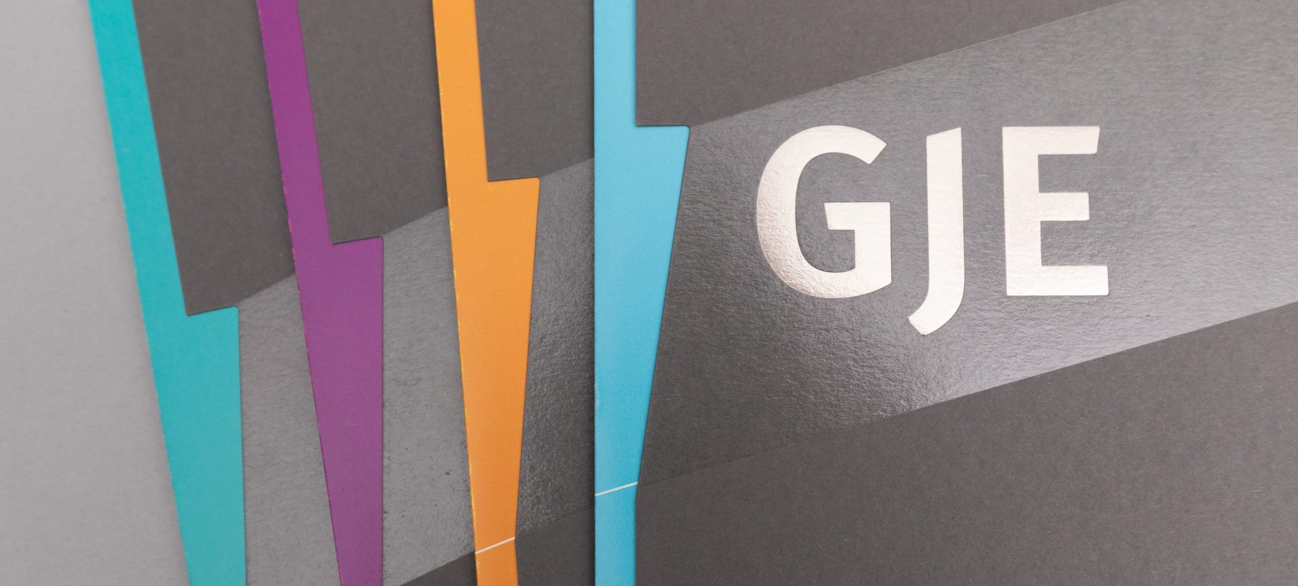 GJE rebranded covers, close up