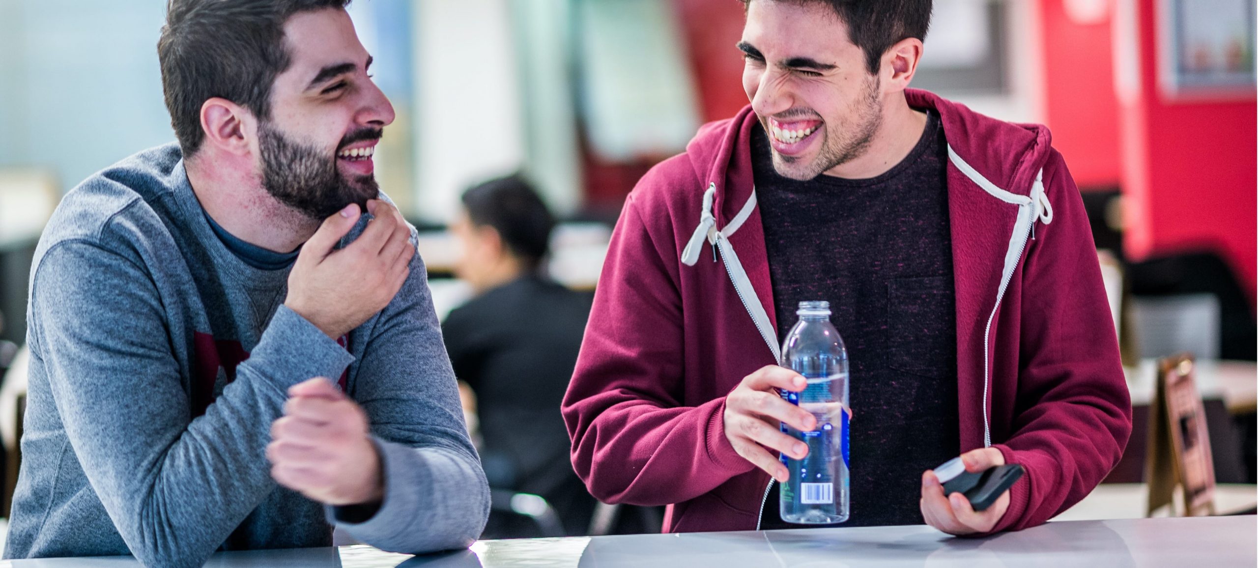 Cass Business School, two student laughing