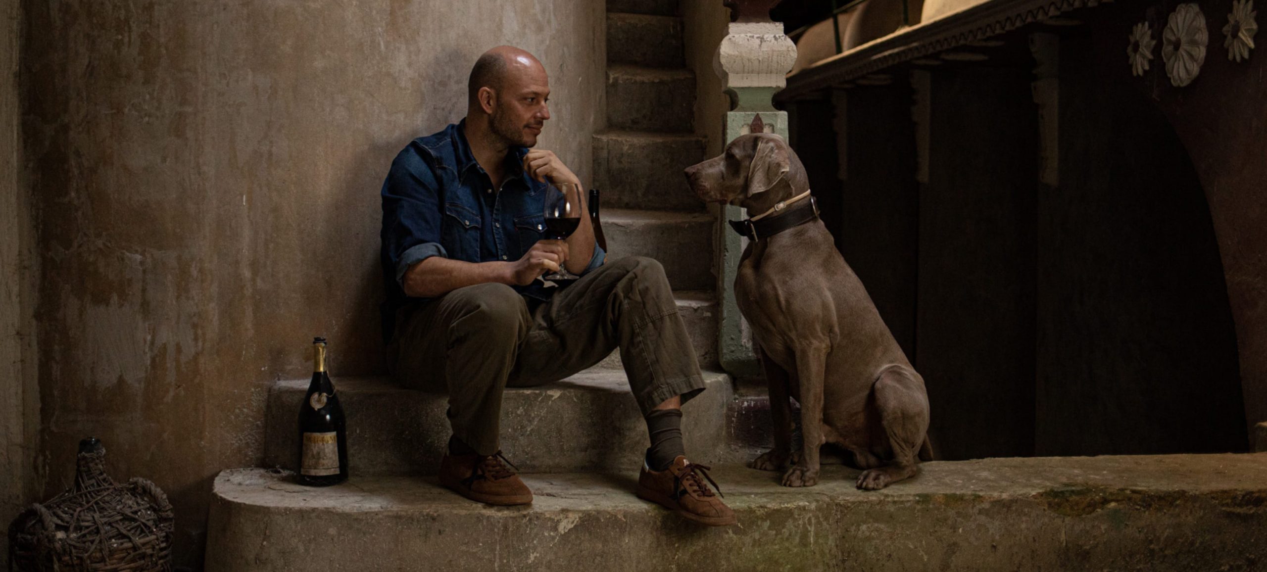 Gaggenau, Elías López Montero tasting wine, with dog