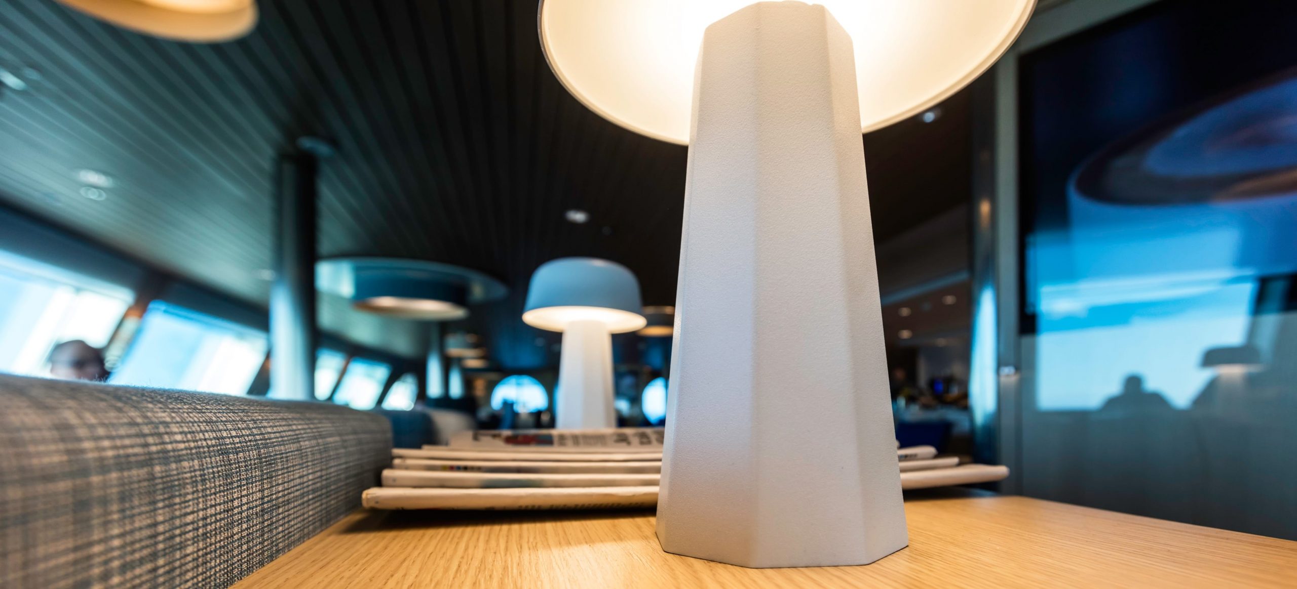 Stena Line, Stena Edda, onboard image of lamps and newspapers