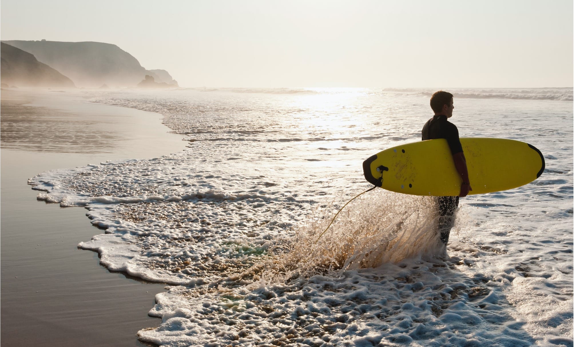 Cambridge Judge Business School, surfer with yellow surfer