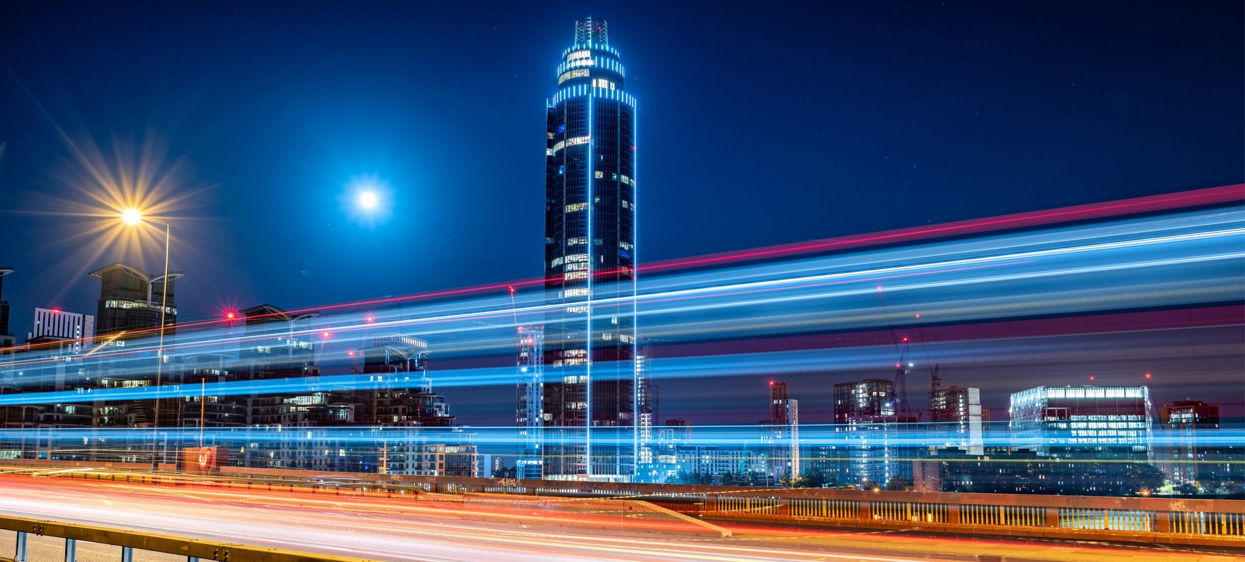 UBS student housing, Chelsea, London, long exposure image of London skyline at night from a bridge