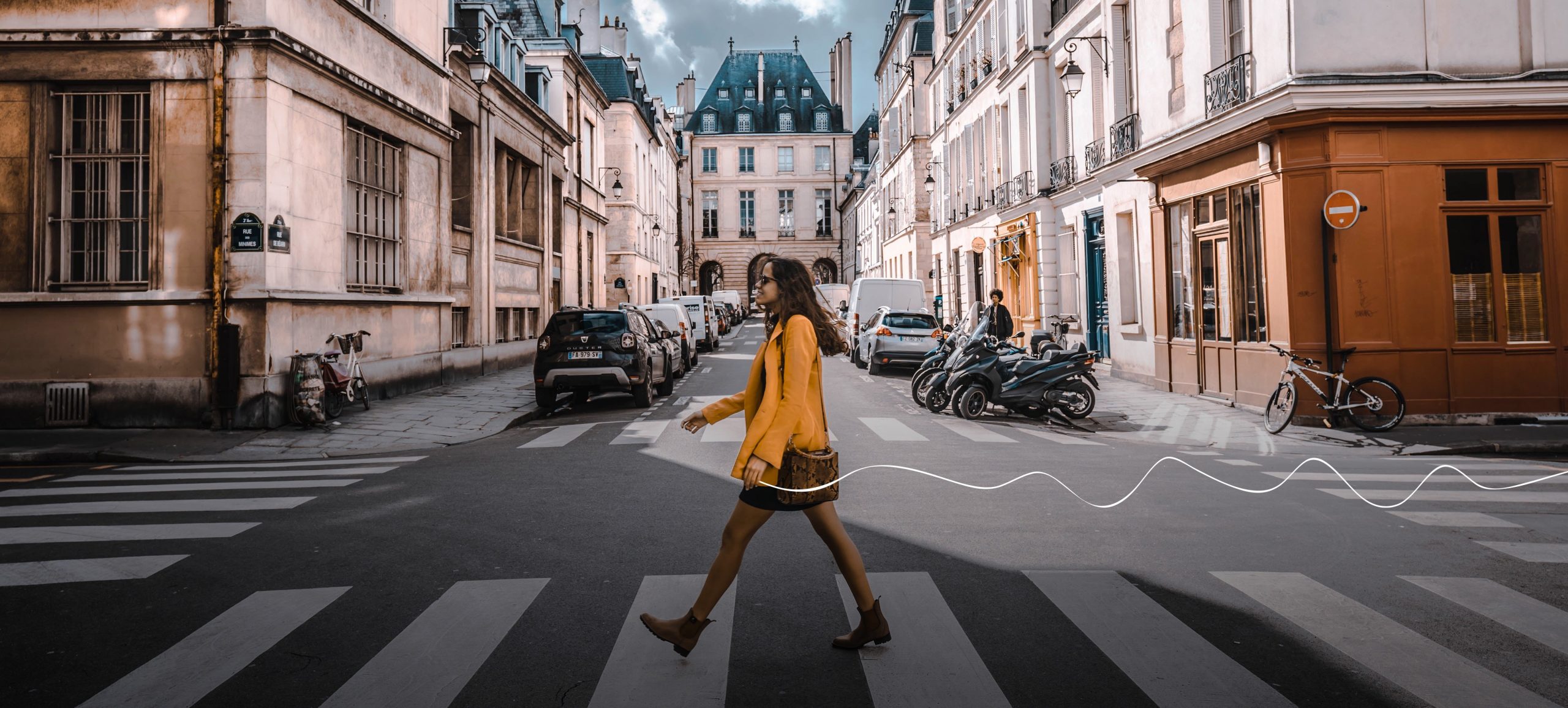 Small Luxury Hotels of the World, SLH, Woman walking across street with the doodle graphic embellishment that connects the imagery to the brand.