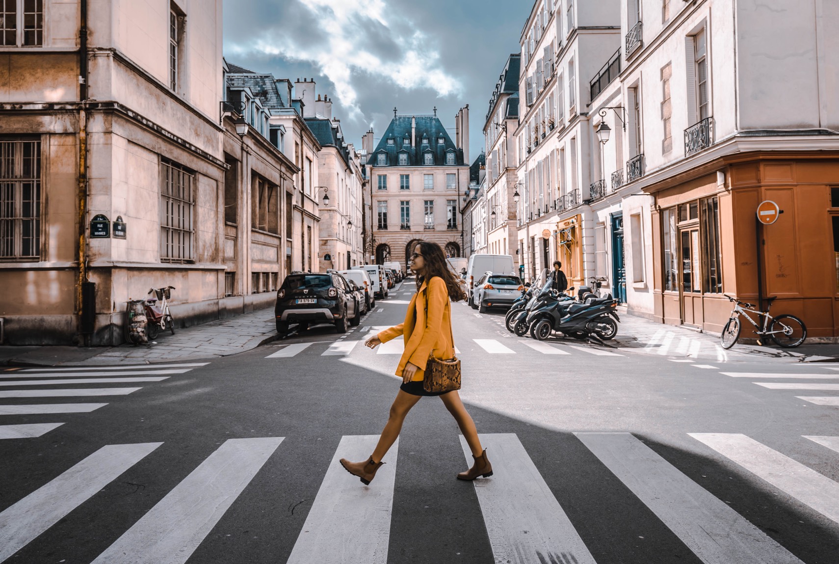 Small Luxury Hotels of the World, SLH, Woman walking across street