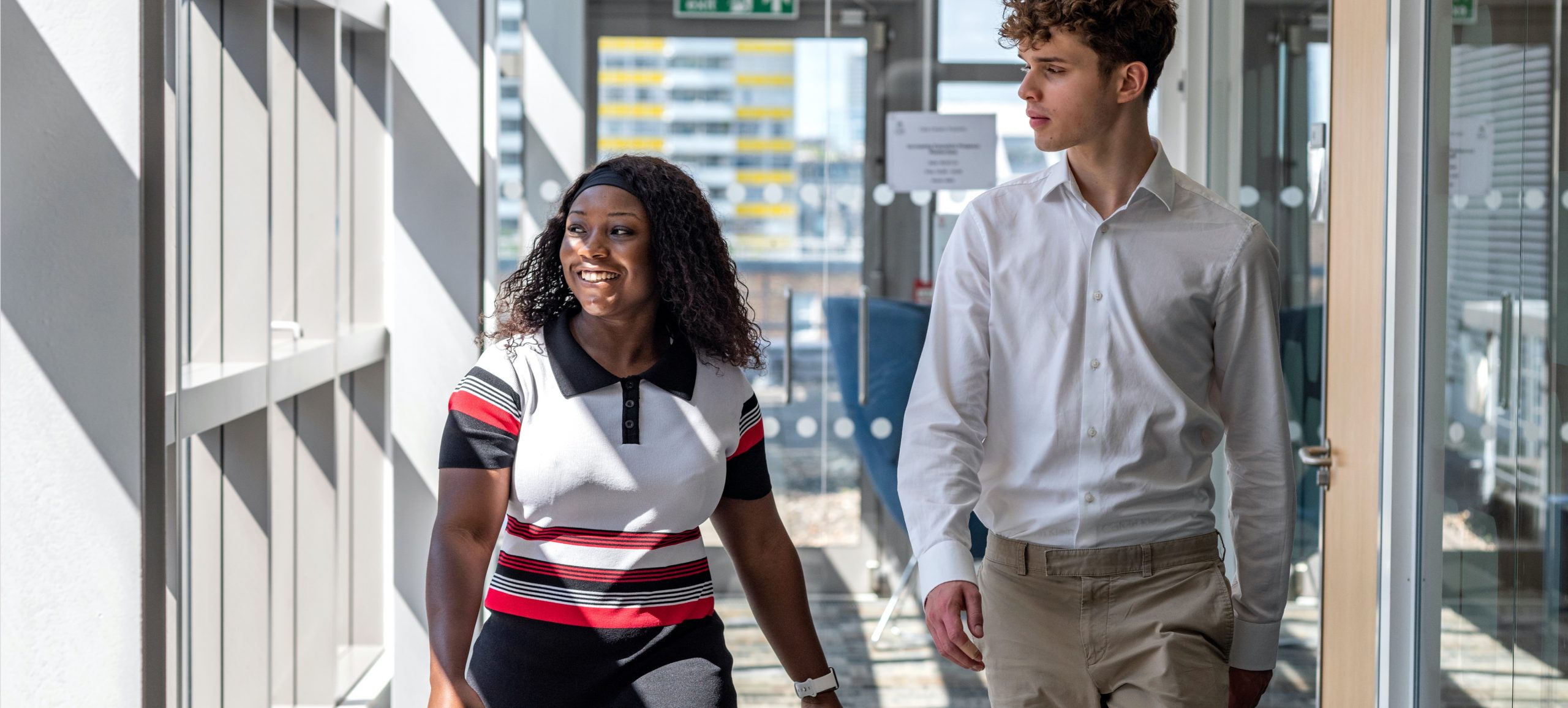 Bayes Business School, commissioned photography, Students walking in school building