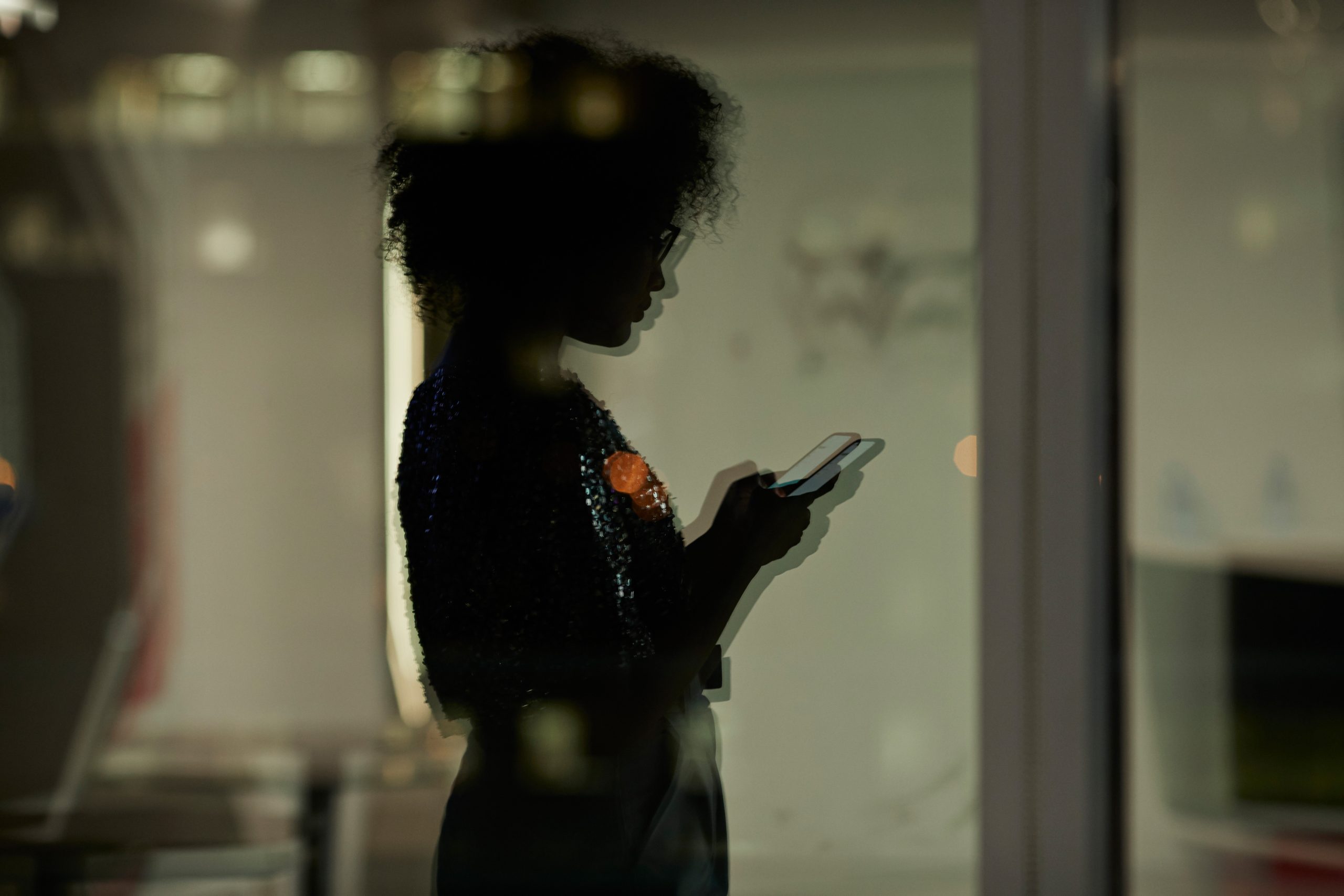 A woman viewing a website on a mobile device